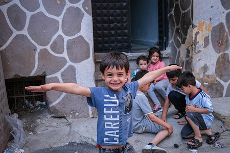 Syrian refugee kid seen posing for a photo in a neighborhood in Izmir during World Refugee Day. According to the figures of the United Nations High Commissioner for Refugees (UNHCR) on 20 June World Refugee Day, there are 108.4 million refugees in the world. Most of the refugees are women and children. Türkiye is one of the countries receiving refugees. As of May 2023, the number of refugees in Turkey has reached 3 million 381 thousand people. Most of the refugees in Turkey are Syrian citizens due to the proximity of the region. The pressure on refugees has increased in recent times. From time to time they are oppressed by racist groups or they are subjected to hate and exclusion in the news.