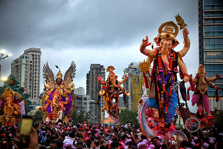 Hindu devotees take the idols of elephant-headed Hindu god Ganesha for immersion deep inside the Arabian Sea on the last day of the ten-day long Ganesha festival. The celebration begins on 'Chaturthi' and concludes on 'Anantha Chaturdashi'.The ten-day Ganesh Utsav concludes with prayers to the elephant-headed deity, revered as the god of wisdom, prosperity and remover of obstacles. Despite intermittent rain, the festive spirit remains high with security, traffic and eco-friendly arrangements in place across the city.