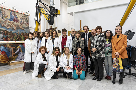 The restorers staff pose for a group photo at the 'Painting and Wood Materials Restoration Laboratory' inside the Vatican Museums. 'Beyond the surface: the restorer's gaze' is the title of the exhibition initiative with which the Vatican Museums celebrate the centenary of the foundation of the 'Painting and Wooden Materials Restoration Laboratory'.
