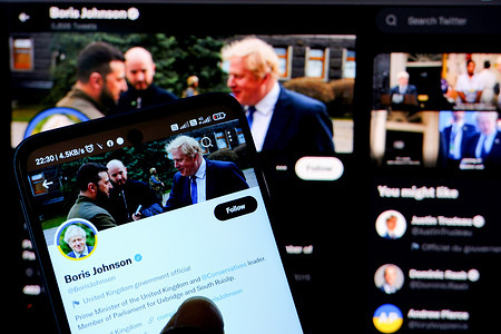 In this photo illustration, UK Prime Minister Boris Johnson's Twitter page is displayed on a smartphone screen.