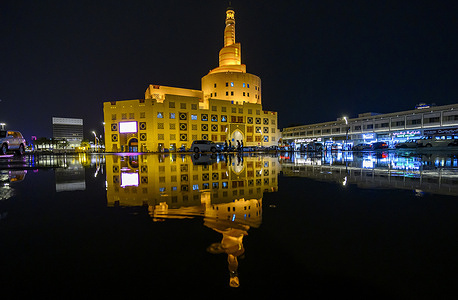 Rainwater reflects the illuminated Fanar Islamic Cultural Centre as heavy downpours and thunderstorms sweep across Doha. The Qatar Meteorology Department stated in its daily report that there is a possibility of moderate to heavy rain and thunderstorms, accompanied by strong winds and reduced visibility.