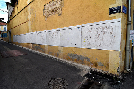 View of blank election billboards on the wall of the building. Electoral billboards, initially planned for the European elections, were cleaned for the legislative elections which will take place on June 29 and 30, 2024 for the 1st round, and July 6 and 7, 2024 for the 2nd round.
