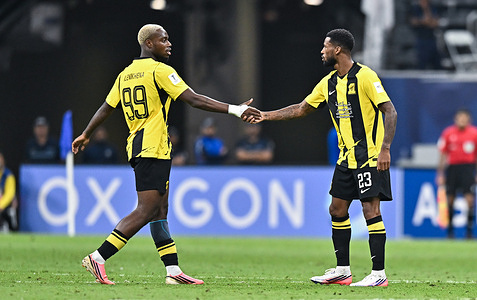 Georginio Wijnaldum (R) of Al Ittihad Club celebrates after scoring a goal during the AFC Champions League elite west football match between Qatar's Al Shamal SC and Saudi Arabia's Al Ittihad Club at Al Bayt Stadium. Final score; Al Shamal SC 1 : 1 Al Ittihad Club.