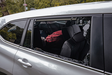 A shattered car window in a parking lot with broken glass scattered on the ground. The contents of the car have been rummaged through and stolen. Car owners in San Francisco are on high alert following a surge in car window theft in the city. Thieves have been breaking into parked cars and stealing valuable items, leaving car owners frustrated and worried about their safety. According to San Francisco Police Department (SFPD), the number of car window thefts has risen sharply in recent months. In February alone, there were 423 reported cases of car break-ins, which is a significant increase from the 272 cases reported in the same month last year. Thieves are targeting vehicles parked in popular tourist areas such as Fisherman's Wharf, Golden Gate Park, and Union Square. However, car break-ins have also been reported in residential neighborhoods across the city. The thieves are not discriminating against any specific type of car, as they have been targeting vehicles of all makes and models. They are breaking into cars, often in broad daylight, and stealing anything of value, including laptops, phones, and other electronic devices.