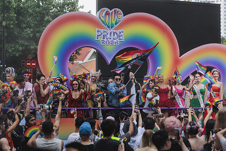 Participants stand on a truck during the Bangkok Pride Parade 2026.
