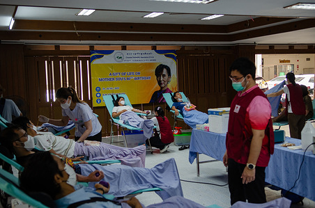 Medical staff at Mae Sot General Hospital are seen assisting blood donors during the donation process. A collective blood donation event was held at Mae Sot General Hospital in Thailand to commemorate the 80th birthday of Nobel Peace Prize laureate Aung San Suu Kyi. The donation drive was led by the Overseas Irrawaddy Association (OIA), with more than 110 donors participating. The participants were members of the Myanmar community in Mae Sot, including migrant workers, activists, and people from various backgrounds, all united in solidarity with their homeland.

The people's leader, Aung San Suu Kyi, has been detained by the Myanmar military junta since February 1, 2021. The people of Myanmar continue to call for her swift release and remain deeply concerned about her health.