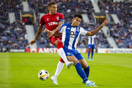 Ranger's player, Alfredo Morelos (L) and FC Porto's player, Luis Diaz (R) are seen in action during the UEFA Europa League match at Dragon Stadium. 
(Final score: FC Porto 1:1 Rangers)