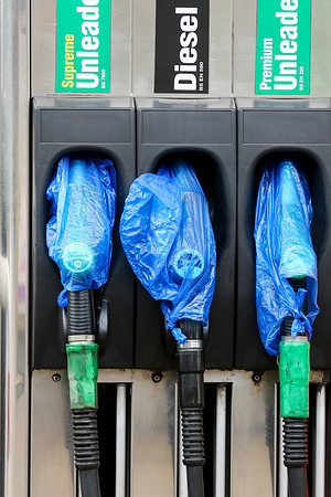 Plastic bags wrapped round the pumps as Texaco petrol station sells unleaded petrol at 183.9 pence per liter and regular diesel at 189.9 pence per liter.