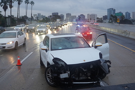 A car crashes to multiple vehicles is seen on the I-5 North highway during the rainstorm . A powerful rainstorm slams San Diego on Christmas Eve, December 24, 2025, turning holiday travel into scenes of disruption. Heavy rain floods roads across the county, forcing multiple closures as emergency crews responded to rising water. At least one person was killed when a tree falls during the storm, highlighting the dangerous conditions brought by strong winds and saturated ground. Governor Gavin Newsom proclaims a State of Emergency for several California counties, including San Diego County, as first responders work through the day to manage flooding, clear debris, and handle multiple car accidents that are reported throughout the region.