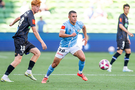 Auckland's Finn McKenlay (L) and Melbourne City's Harry Politidis (R) seen in action during the A-Leagues Men game between Melbourne City FC to Auckland FC at AAMI Park. Final score Melbourne City FC 2:2 Auckland FC.