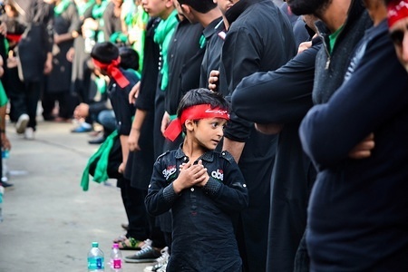A young Kashmiri Shiite devotee seen taking part in a mourning procession marking the day of Ashura in Srinagar, Kashmir.
Ashura is the tenth day of Muharram, the first month of the Islamic calendar, observed around the world in remembrance of the martyrdom of Imam Hussain, the grandson of Prophet Muhammad.