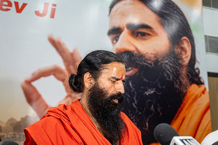On the occasion of Ayurveda Day, Indian yoga guru and Patanjali Ayurved co-founder Baba Ramdev speaks at a press conference at the Constitution Club of India, rejecting allegations of adulteration in Patanjali Ayurved products. Ramdev rejected claims questioning the quality and authenticity of Patanjali products, including its medicines and ghee, and stated that all products are authentic and laboratory tested. Baba Ramdev is an Indian yoga guru, entrepreneur and public figure known for promoting yoga, Ayurveda and traditional Indian wellness practices through television, public events and yoga camps.