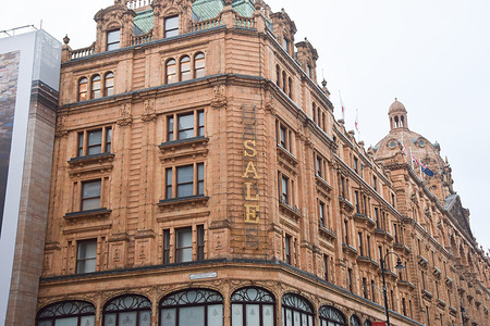 General view of Harrods in Knightsbridge with a 'Sale' sign on Boxing Day.