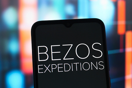 In this photo illustration, the Bezos Expeditions logo is seen displayed on a smartphone screen.