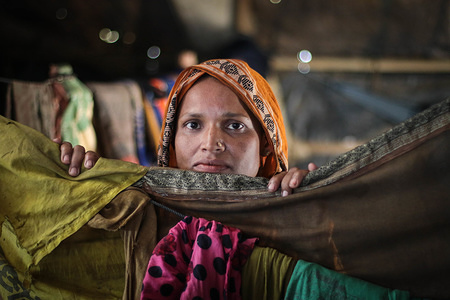 A Rohingya woman seen inside her shelter in Kutupalong camp.
More than 600,000 Rohingya refugees have fled from Myanmar Rakhine state since August 2017, as most of them keep trying to cross the border to reach Bangladesh every day.