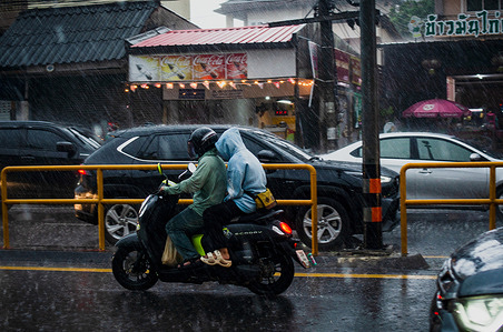 Vehicles navigate a heavy downpour in Chiang Mai as Typhoon Ragasa brings severe weather to northern Thailand. The intense rainfall is caused by the outer bands of Super Typhoon Ragasa. Authorities in Thailand have warned the public to prepare for severe weather and potential widespread flooding as the storm affects the northern regions of the country.