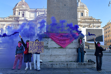 Protesters hold smoke flares and a placard during the national march against DDL Bongiorno. The march opposes the bill that would replace consent with 'contrary will' in sexual violence law. DDL Bongiorno" refers to a proposed amendment to Italy's sexual violence laws (article 609-bis of the Criminal Code) introduced in January 2026 by Senator Giulia Bongiorno. The acronym DDL stands for Disegno di Legge (Bill/Draft Law). Opponents say DDL bill forces victims to demonstrate that they clearly and explicitly resisted or said "no" rather than investigating whether the aggressor had consent.