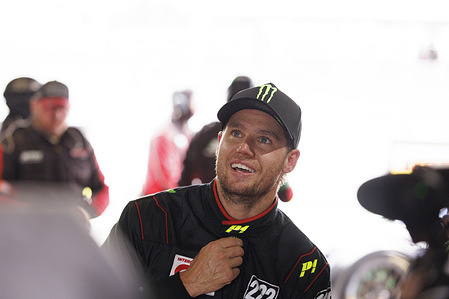 Cameron Waters of the Scott Taylor Motorsport team seen talking with media in garage after winning provisional pole position ahead of the Bathurst 12 Hour race at Mount Panorama .