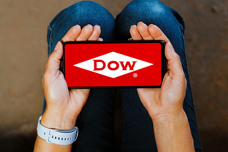 In this photo illustration, the Dow Chemical Company logo is displayed on a smartphone screen.