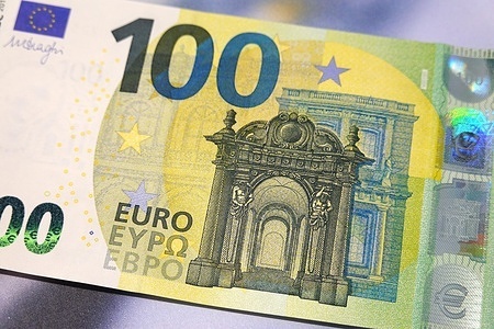 In this photo illustration, one hundred - euro banknote seen displayed. The 100 - euro banknote, issued by the European Central Bank with anti - counterfeiting features, is widely used in EU member states, facilitating regional economic transactions and financial integration.