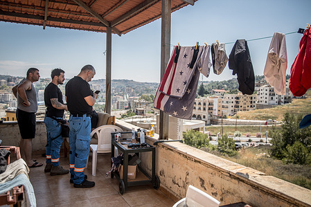 Paramedics watch for Israeli airstrikes from the headquarters of the Nabatieh Ambulance Service. Since all-out war between Israeli and Hezbollah restarted on March 2, more than 3,700 people have been killed including 132 medical workers and first responders according to Ministry of Health.