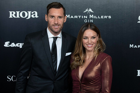 Rudy Fernandez and Helen Lindes attend the Esquire Men Of The Year photocall at Casino de Madrid in Madrid.