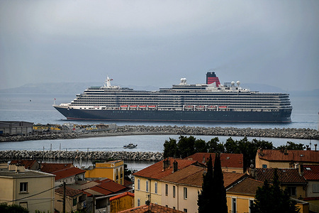 View of the Queen Victoria arriving in Marseille. The passenger cruise ship Queen Victoria arrives at the French Mediterranean port of Marseille.