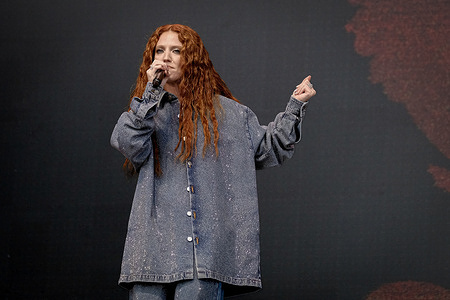 English singer and songwriter Jessica Hannah Glynne, known professionally as Jess Glynne performs live on stage at the Isle of Wight Festival. Jessica Hannah Glynne has achieved a Grammy Award and nine Brit Award nominations. Forbes magazine considered her one of the "Most Influential People Under 30" in 2019.
