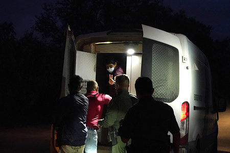 Migrants from Venezuela are loaded by Border Patrol into a van in Del Rio Texas after having crossed the US / Mexico border at Del Rio Texas USA.
According to unofficial estimates approximately 200,000 migrants have crossed into the United States along the southern border since February 2021.