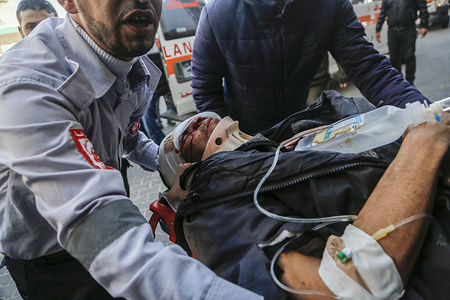 An injured demonstrator lying on a stretcher seen being taken to Shifa hospital to receive treatment during the clashes.
Clashes at the Israel border in an anti-occupation march near the eastern border in Gaza Strip.