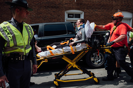 An injured woman is seen wheeled away from the scene where Jame Alex Fields made his attack.
August 11-12 2017 a "Unite The Right Rally" took place in protest of confederate monuments being removed from around the United States. Throughout the day there were violent clashes between Alt-right protestors and counter protestors. The day concluded with 20-year-old white nationalist James Alex Fields plowing his car into a group of counter protestors, killing one person, 32-year-old Heather Heyer and injuring 19.
James Alex Fields was convicted guilty of first degree murder from the attack.