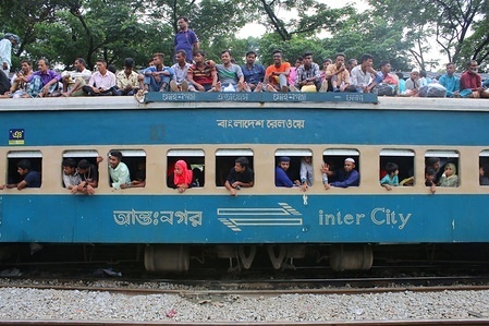 Bangladeshi people cram onto a train as they travel back home to meet their families ahead of the Muslim festival of Eid al-Fitr, in Dhaka.
Muslims around the world are preparing to celebrate the Eid al-Fitr holiday, which marks the end of the fasting month of Ramadan.