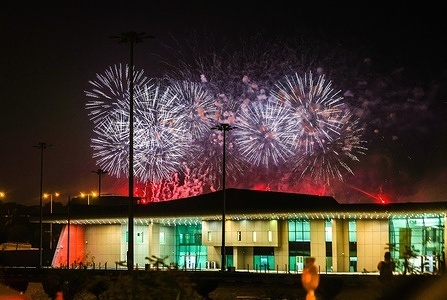 Fireworks light up the sky above Katara Cultural Village during Qatar National Day celebrations. Qatar National Day commemorates the unification of the country in 1878.