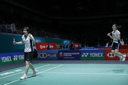 Kaho Osawa (L) and Mai Tanabe of Japan celebrate victory after winning against Kim Hey Jeong and Kong Hee Yong of Korea (not pictured) during the Women's Doubles Round 16 match of the Petronas Malaysia Open 2026 at Axiata Arena. Kaho Osawa and Mai Tanabe won with scores; 23/17/21 : 21/17/19