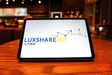 In this photo illustration, the Luxshare Precision logo is displayed on the screen of a tablet.