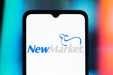 In this photo illustration, the NewMarket Corporation (New Market) logo is seen displayed on a smartphone screen.