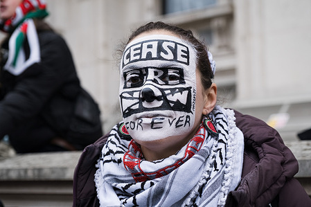 A protestor with a face paint that reads “Cease Fire Forever” poses for a portrait during the rally. Coincided with news that Israel’s cabinet has approved a Gaza ceasefire deal, Palestine Solidarity Campaign rally continues to take place in Central London. While the Metropolitan Police blocked the PSC’s planned marching route to Portland Place which targets the BBC headquarters, a static protest was organized in Whitehall as a result. Some protestors have clashed with police during the rally and there are eight people arrested according the Met Police.
