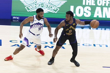 Los Angeles Lakers’ Bronny James (9) is defended by Utah Jazz's Elijah Harkless (16) during an NBA basketball game, at Crypto.com Arena. Lakers 140:126 Jazz.