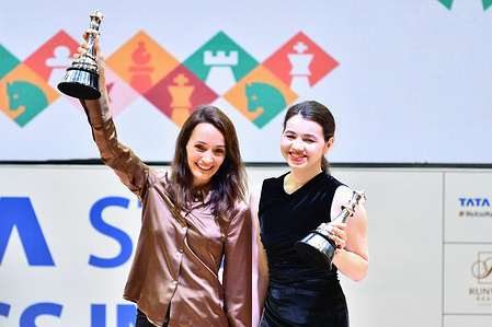 Russian Grandmaster Kateryna Lagno (L) and Russian Grandmaster Aleksandra Goryachkina (R) posing with their trophies during the 6th TATA Steel Chess India Tournament at Dhono Dhanyo Auditorium.