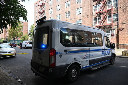 An ambulance is seen at the scene where a 34-year-old man was fatally shot in the area of 710 Croes Avenue within the confines of the 43 Precinct/PSA 8 in Bronx. On Tuesday afternoon at approximately 1:11 PM, police responded and discovered a 34-year-old male, unconscious and unresponsive with a gunshot wound to the torso. EMS responded and transported the male aided to NYC Health + Hospitals/Jacobi where he was pronounced dead. There are no arrests and the investigation remains ongoing. This is the second fatal shooting in the Bronx, on Tuesday.