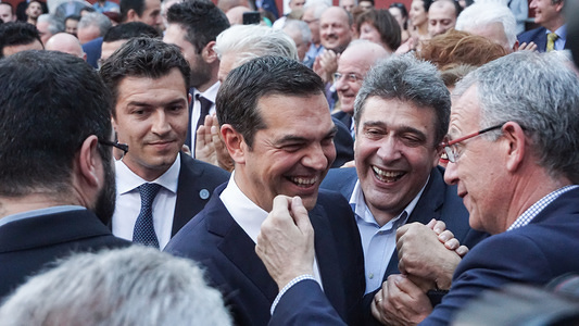 The Greek Prime Minister Alexis Tsipras ahead of his speech to the lawmakers of his party.
The Greek Prime Minister Alexis Tsipras addresses the members of his party wearing a tie for the first time in more than three years. Greece has solved its debt problems, and during his speech, Tsipras hailed Friday’s deal in Luxembourg.
