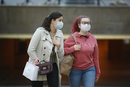 Women wearing face masks as protective measure against coronavirus (COVID-19) walk on the street amid coronavirus crisis.
Russia has recorded at least 379051 cases and 4142 deaths by the COVID-19 disease.