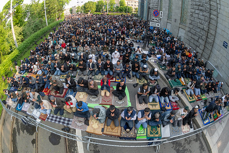 Muslims perform a prayer celebrating Eid al-Adha near the Cathedral Mosque. Muslims prayed in the streets near mosques celebrating Eid al-Adha one of the most important holidays in Islam.