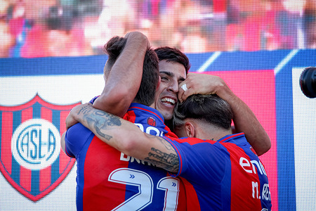 Matias Cuello of San Lorenzo and his teammates celebrate during the match between San Lorenzo and Tigre as part of 8vos de la Liga Profesional de Futbol Argentino at Pedro Bidegain Stadium. Final Score: San Lorenzo 2 - 1 Tigre.