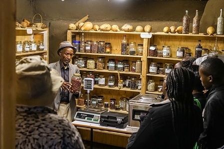A trainer holding a jar of preserved seeds takes participants through a session at the Seed Savers Network seed bank in Gilgil. Fifteen Kenyan smallholder farmers are challenging the constitutionality of the Seeds and Plant Varieties Act (Cap 326 2012) which they allege criminalizes the saving, exchange and informal distribution of farmer-developed seed varieties. The petition supported by Seed Savers Network, Greenpeace and the Biodiversity and Biosafety Association of Kenya (BIBA), is set for ruling at Machakos High Court (Constitutional & Human Rights Division) in November and will determine whether the law violates farmers’ constitutional rights to save, share and preserve their own seeds.