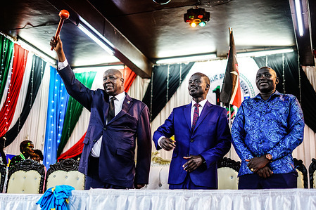 South Sudan s' Ambassador to Kenya, H.E. Amb. Anthony Louis Kon (3L) gestures during celebrations to mark the 14th anniversary of South Sudan’s independence from Sudan.