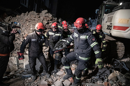 Georgia search and rescue teams carry the lifeless body of a person from the rubble. Monday morning, a strong 7.7 magnitude , centered in the Pazarcik district, jolted Kahramanmaras and strongly shook several provinces, including Gaziantep, Sanliurfa, Diyarbakir, Adana, Adiyaman, Malatya, Osmaniye, Hatay, and Kilis. Later, at 13.24 p.m. (1024GMT), a 7.6 magnitude quake centered in Kahramanmaras' Elbistan district struck the region. Turkiye declared 7 days of national mourning after deadly earthquakes in southern provinces.
