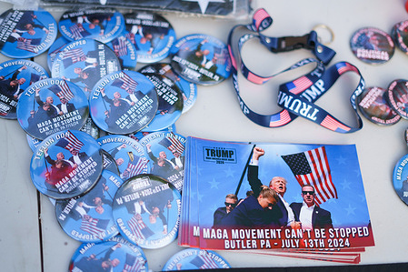 Trump campaign memorabilia with an image of the near assassination is sold outside Finserv Forum on the second day of the Republican National Convention (RNC). The Republican National Convention (RNC) is going on as planned despite the assassination attempt against Trump will conclude with him accepting his party's presidential nomination.