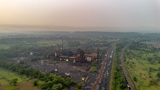 (EDITORS NOTE: Image taken with drone) Aerial view of a coal-based sponge iron plant highlighting the expansive carbon footprint of heavy industrial processing infrastructure. Observed globally on June 5, World Environment Day highlights environmental sustainability. The Jamshedpur city is one of the most heavily industrialized and mineral-rich states. It balances carbon-intensive coal mining and manufacturing operations against ecologically sensitive forests inhabited by indigenous communities. These high-emission sectors face increased scrutiny as industries navigate the regulatory and compliance challenges of the European Union’s Carbon Border Adjustment Mechanism (CBAM) policy on carbon-heavy imports.