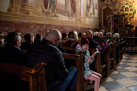 Devotees attend a Holy Mass on Palm Sunday in a landmark in Monastery of the Missionary Oblates of Mary Immaculate - Sanctuary of the Relics of the Holy Cross on Saint Cross mountain in Switokrzyskie mountains.